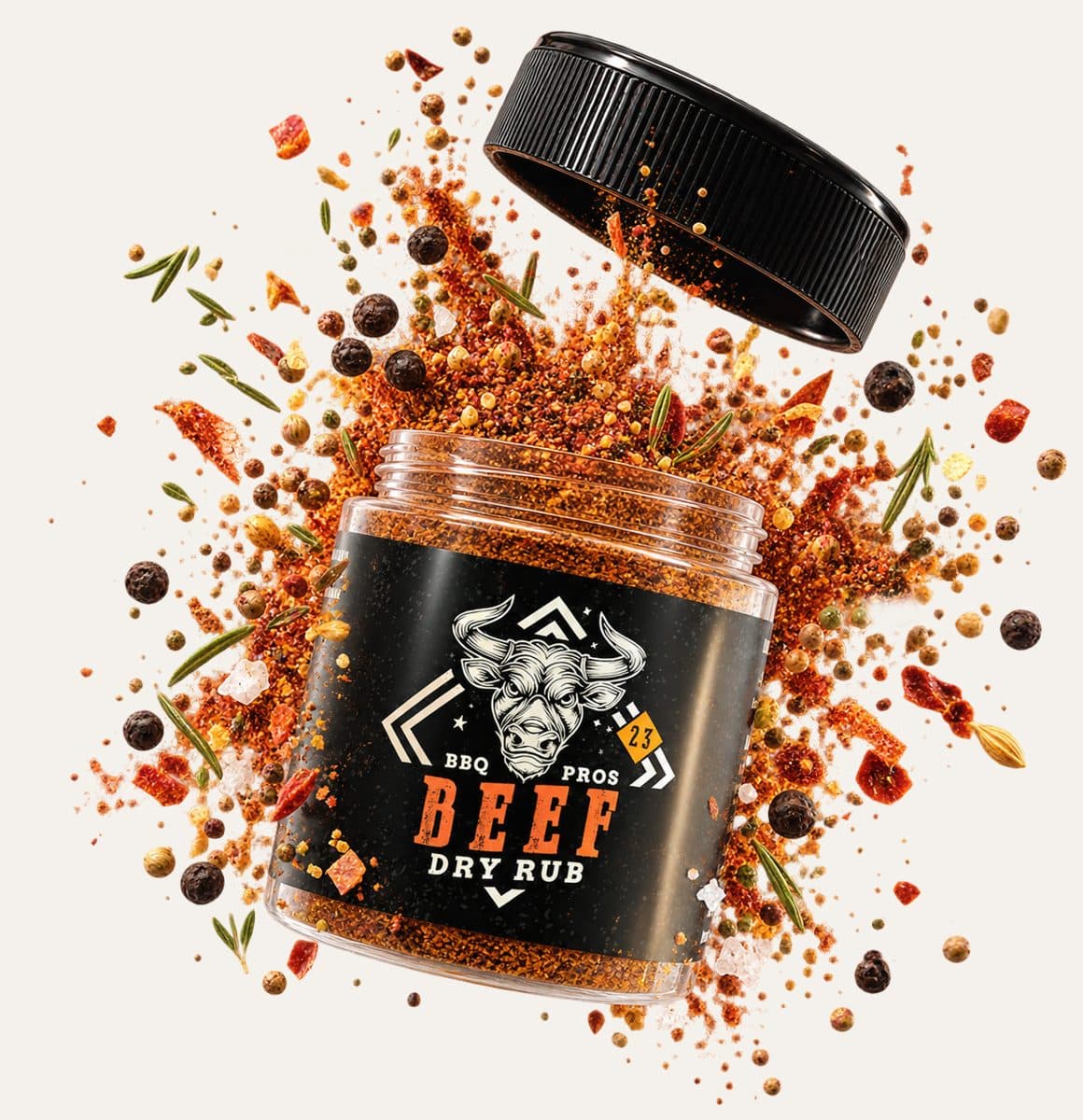 Barattolo di dry rub per barbecue con il tappo che salta e una nuvola di spezie